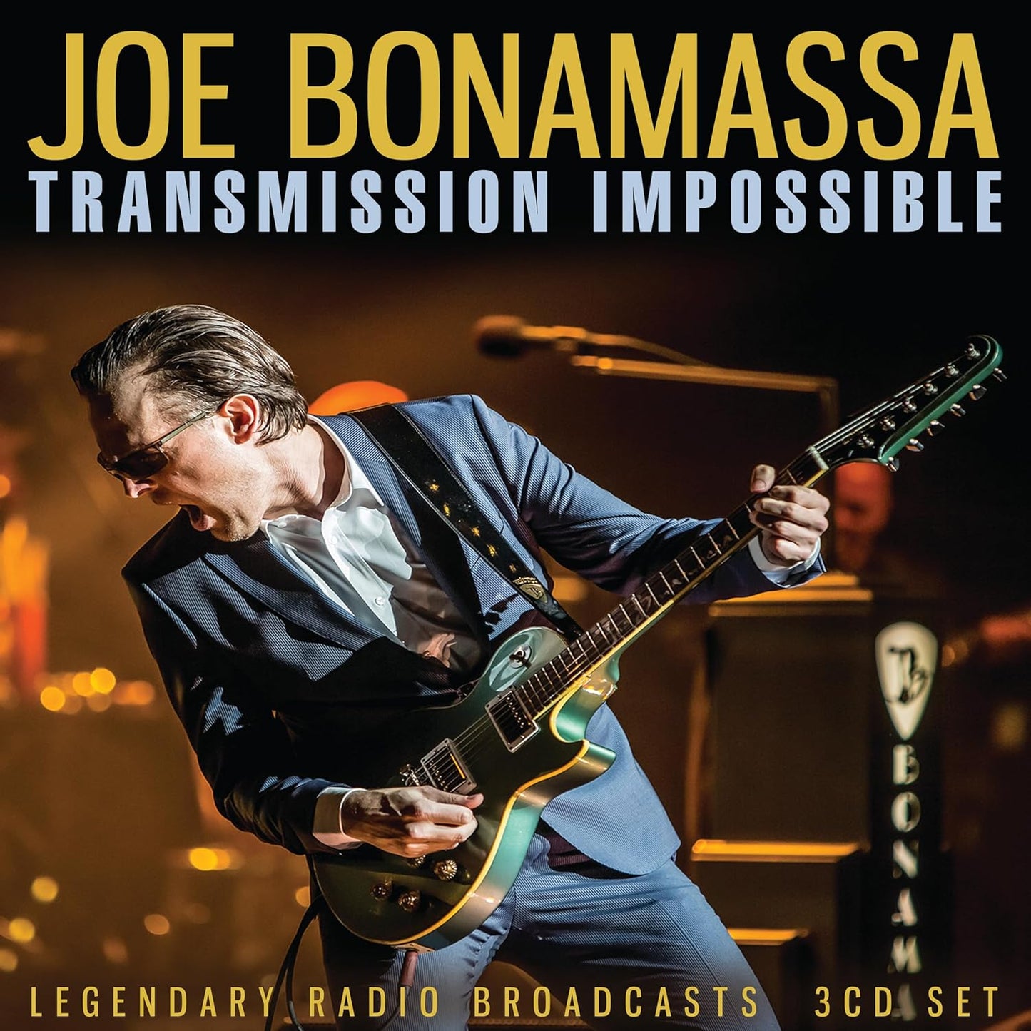 Joe Bonamassa album cover, guitarist playing a sunburst electric guitar.