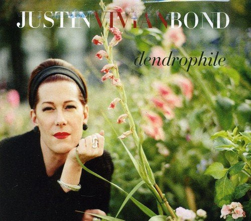 CD cover featuring Justin Vivian Bond with flowers, titled "dendrophile".
