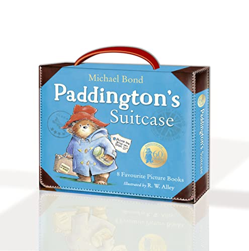 Blue suitcase-shaped book set featuring Paddington Bear and text.
