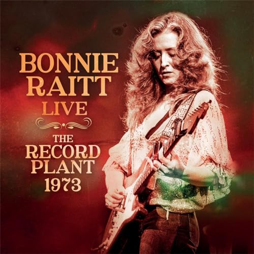 Bonnie Raitt playing guitar on album cover, 1973 live recording.