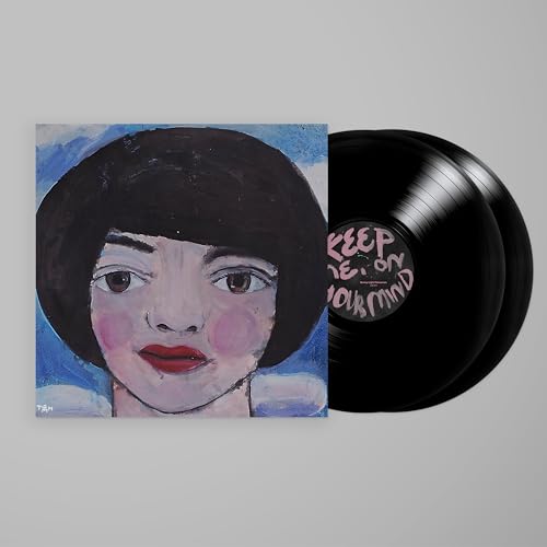 Vinyl record with painted portrait of a woman and text label.