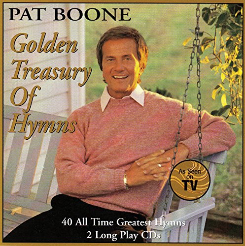 Pat Boone on porch swing, smiling, wearing pink sweater, on CD cover.
