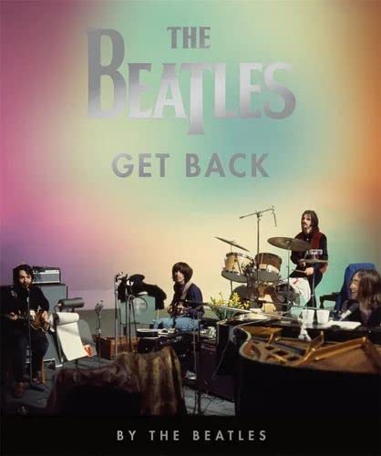 The Beatles playing instruments in a studio, book cover image.