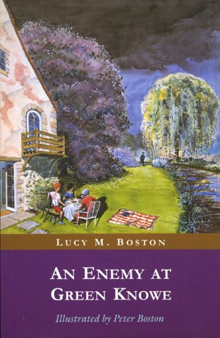 Book cover: painted house, garden, people at a picnic, titled "An Enemy at Green Knowe".
