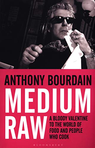 Book cover featuring Anthony Bourdain with a forkful of meat.