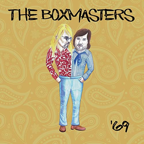 Album cover art featuring a two-headed figure on a gold paisley background.