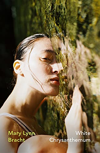 Close-up of a woman’s face partially obscured by foliage, book cover.