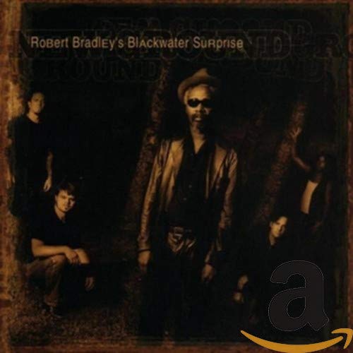 Album cover for New Ground by Robert Bradley's Blackwater Surprise featuring band members.