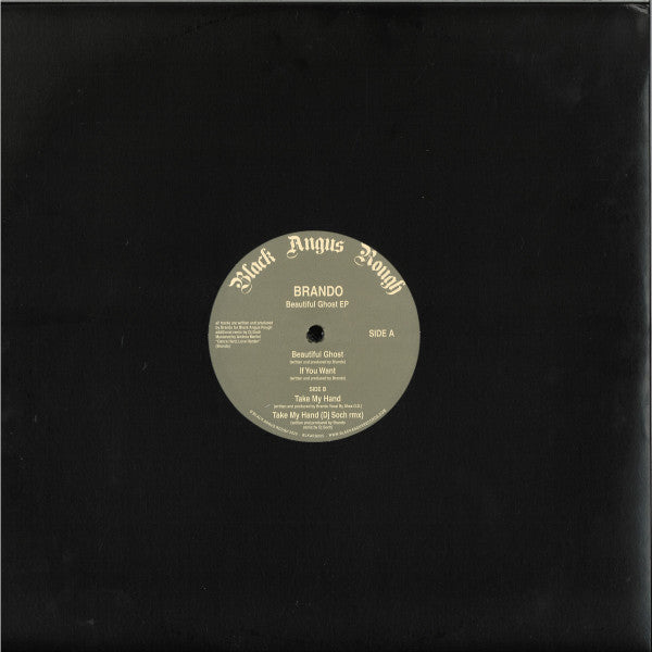 Black vinyl record with a cream-colored label displaying song titles.