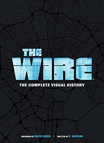 Book cover for "The Wire: The Complete Visual History" with cracked map design.