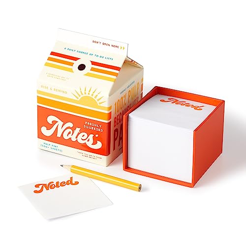 Orange and cream notepad shaped like a juice carton with a pencil.