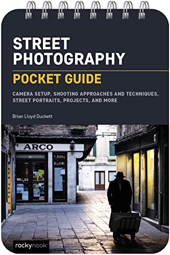Spiral-bound book cover titled Street Photography Pocket Guide featuring a man on a street.