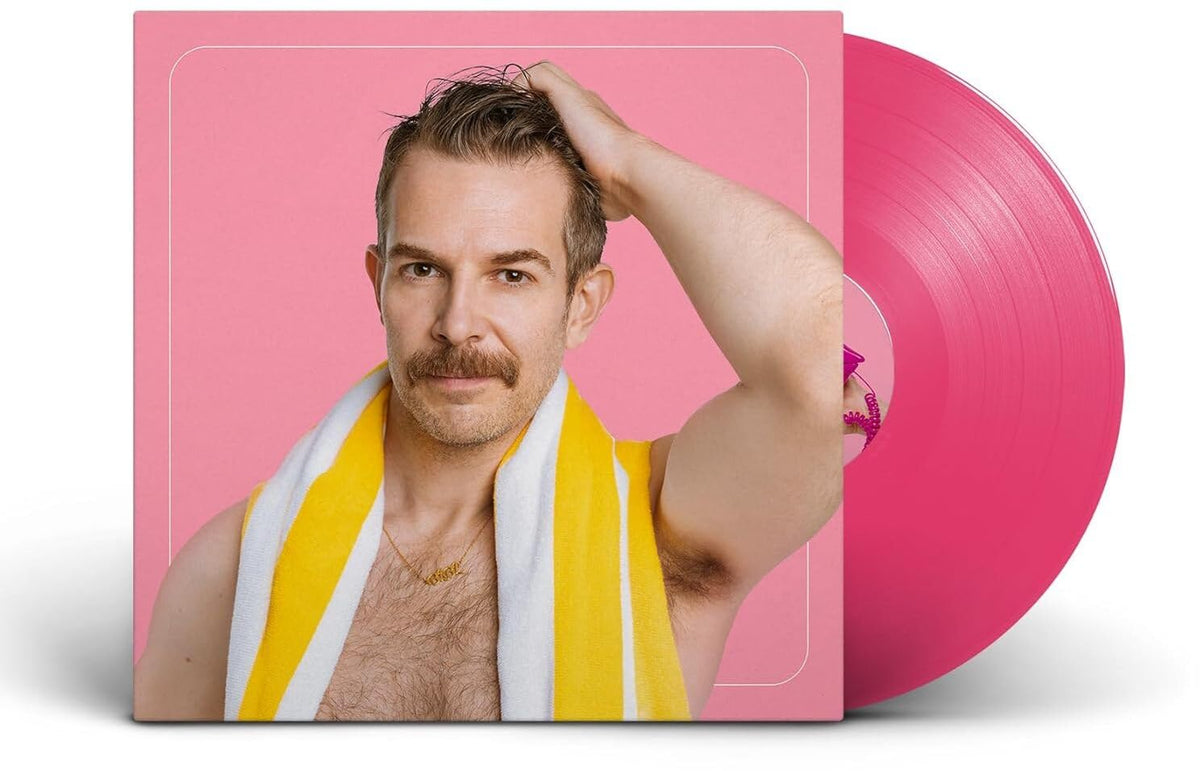 Pink vinyl record with album cover featuring a man with a mustache.