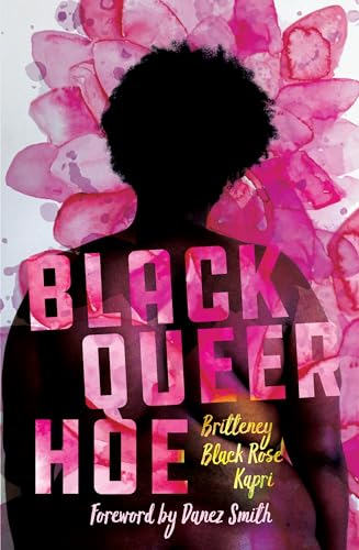 Book cover with silhouette of a person and pink floral background.