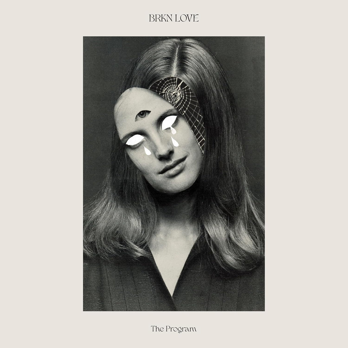 Black and white portrait of a woman with surreal, multiple eyes.