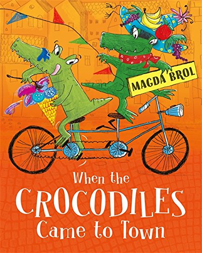Two green crocodiles ride a bicycle through a colorful town.