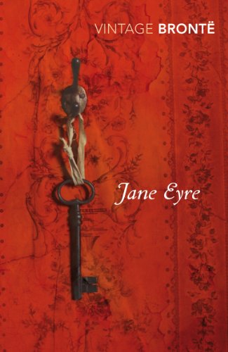 Red book cover of "Jane Eyre" with a key and floral design.
