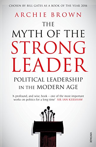 The image depicts a book cover with a lectern and microphones. Alt text: Book cover with lectern, microphones, and title "The Myth of the Strong Leader".