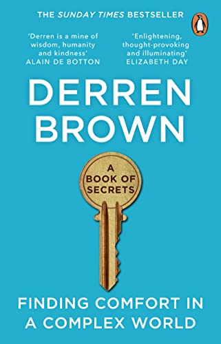 Book cover: “A Book of Secrets” by Derren Brown, with a golden key.