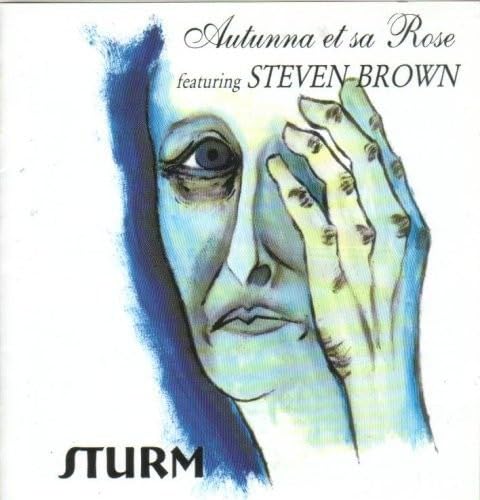 CD cover: blue-toned portrait with stylized eye and hands.