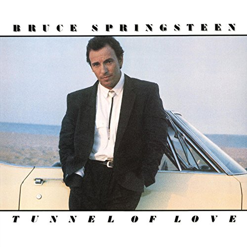 Bruce Springsteen album cover, "Tunnel of Love," featuring a portrait and car.