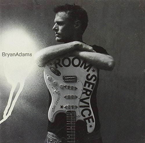 Black and white album cover featuring Bryan Adams with a guitar.