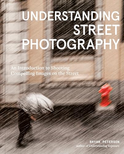 Book cover with title "Understanding Street Photography" and rainy street scene.