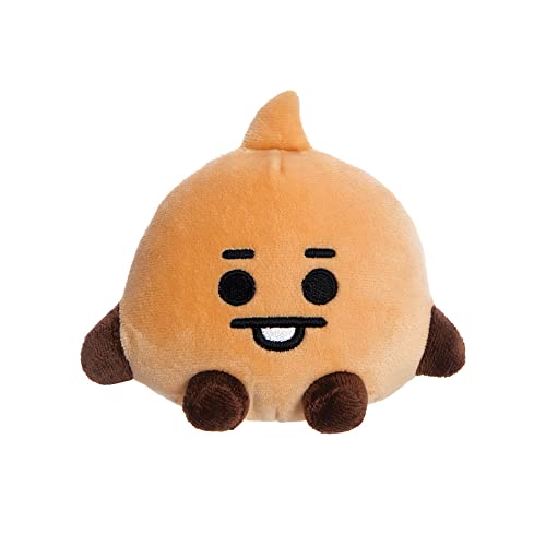 Small, tan BT21 Shooky plush toy with a smiling face and brown feet.