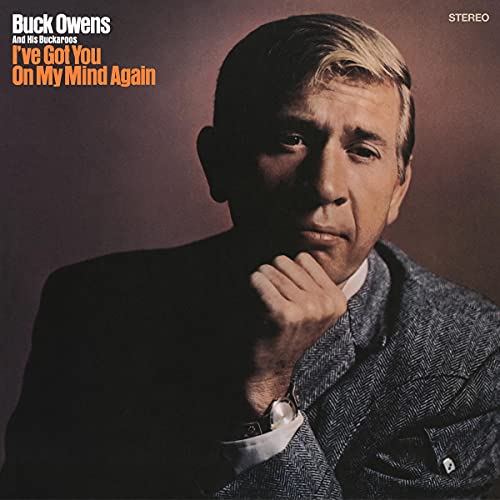 Album cover featuring a portrait of Buck Owens in a tweed jacket.