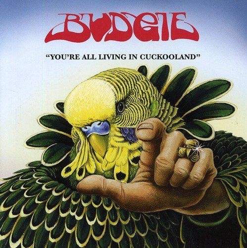 Album cover: yellow budgies and a pointing hand with a ring.