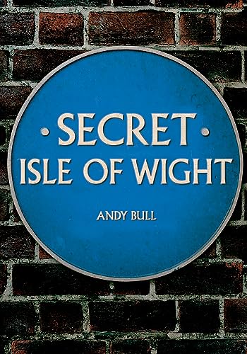 Blue circular plaque reading "Secret Isle of Wight" against a brick wall.