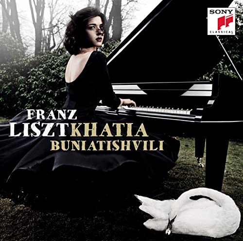 Khatia Buniatishvili at a grand piano with a white swan nearby.