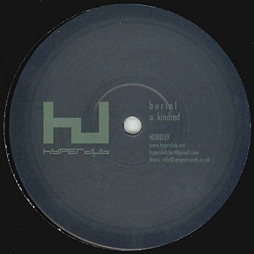 Dark gray vinyl record label with green logo and white text.