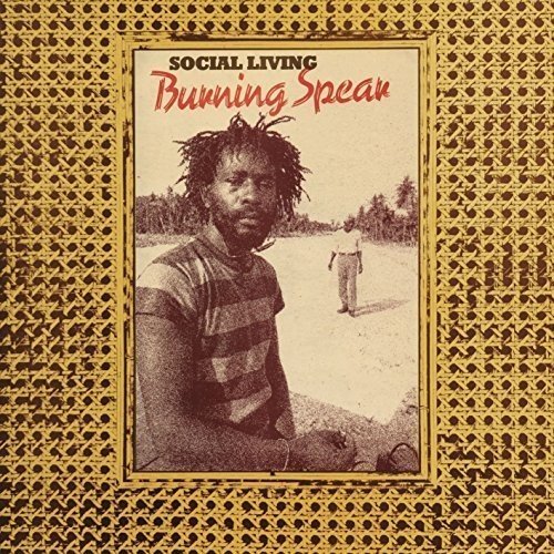 Burning Spear album cover: a man with dreadlocks and a distant figure.