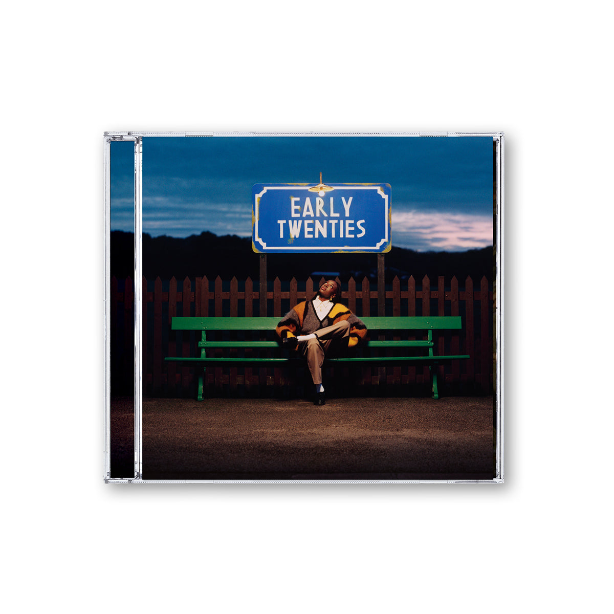 CD cover for Cat Burns’ “Early Twenties” featuring a person on a bench.