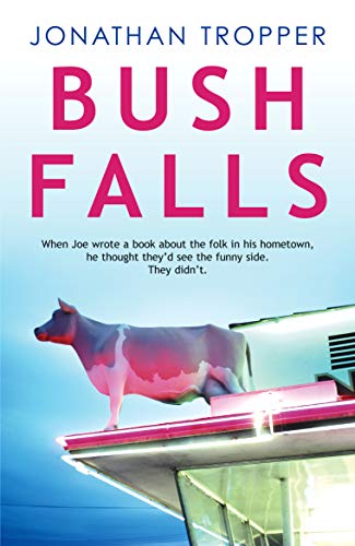 Book cover for "Bush Falls" featuring a cow on a diner roof.