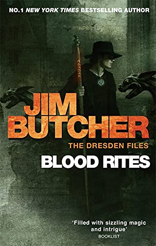 A man in a hat holding a staff stands between two gargoyles on book cover.