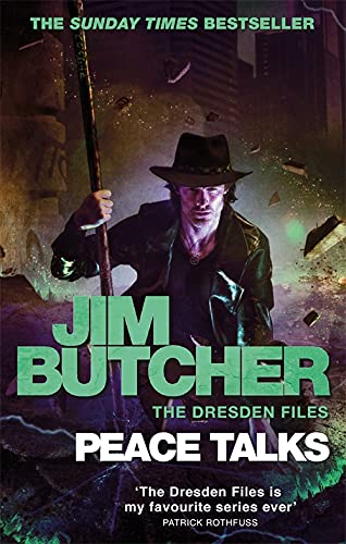 Book cover featuring a man in a leather jacket and hat holding a staff.