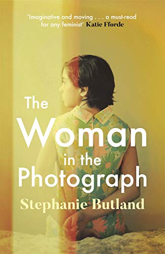 Book cover featuring a woman in a floral dress, looking left.