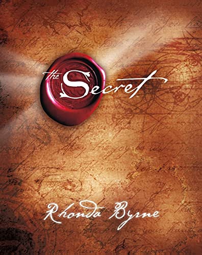 Book cover for The Secret by Rhonda Byrne featuring a red wax seal.
