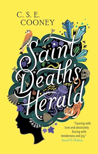 Book cover: yellow background, black silhouette, ornate floral and animal designs.