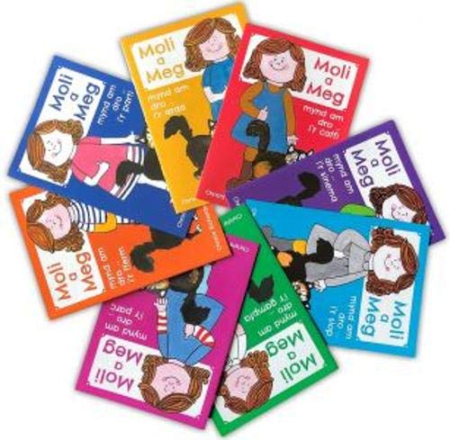 Stack of colorful children’s books featuring illustrated girls and cats.