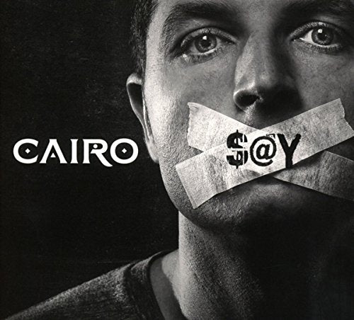 Black and white image of a man with tape over his mouth.