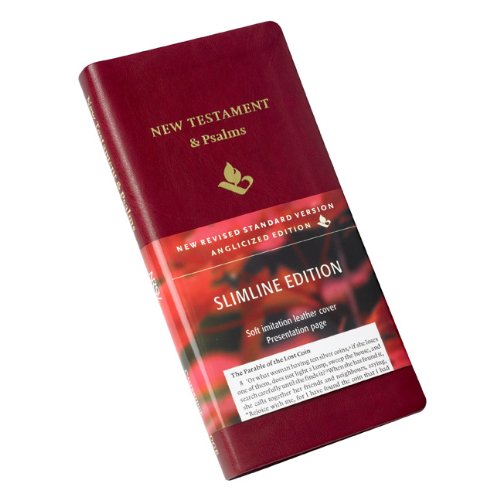 Burgundy imitation leather New Testament and Psalms book with a paper belly band.
