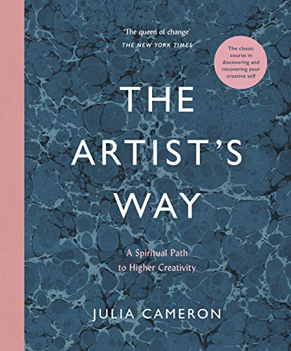 Hardback book cover of The Artist's Way with a blue marbled pattern and pink spine.