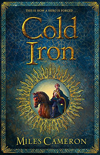 Book cover: "Cold Iron" depicts a rider on horseback within a sunburst frame.