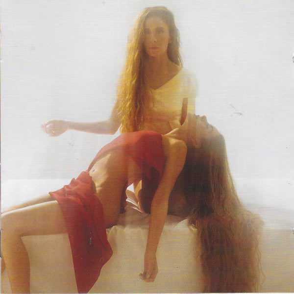 CD cover: Two long-haired women in a pale, blurry image.
