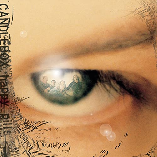 Close-up of an eye reflecting a band within a dark, abstract design.