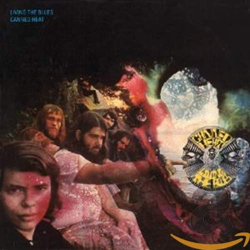 Canned Heat album cover, “Living The Blues”, featuring band members in a hazy scene.