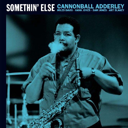 "Cannonball Adderley album cover featuring a man playing saxophone, smoking a cigar."